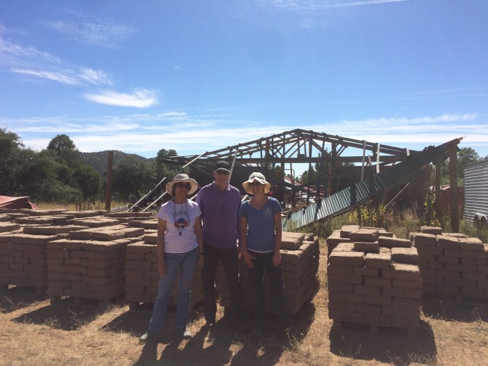Anne, Chris, and Megan with adobe pallets